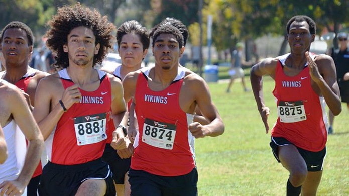 Sophomore Gerardo Salazar (left) leads freshmen Jordan Horton and Willie Jenkins at the start of the SoCal Preview Meet in San Diego. (Photo by Julio Jimenez)